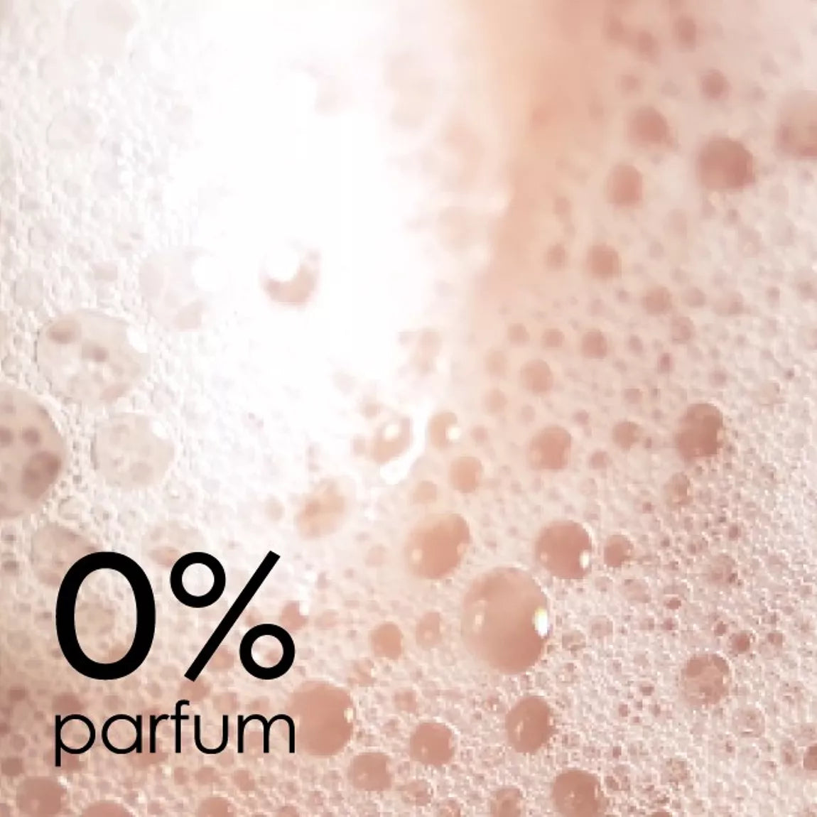 A close-up of a bubbly, foamy liquid, with large black text reading '0% parfum' in the lower left.