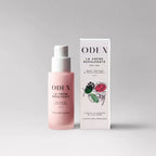 A pink pump bottle and its white rectangular box for Oden La Crème Repulpante, displayed on a clean light gray background.