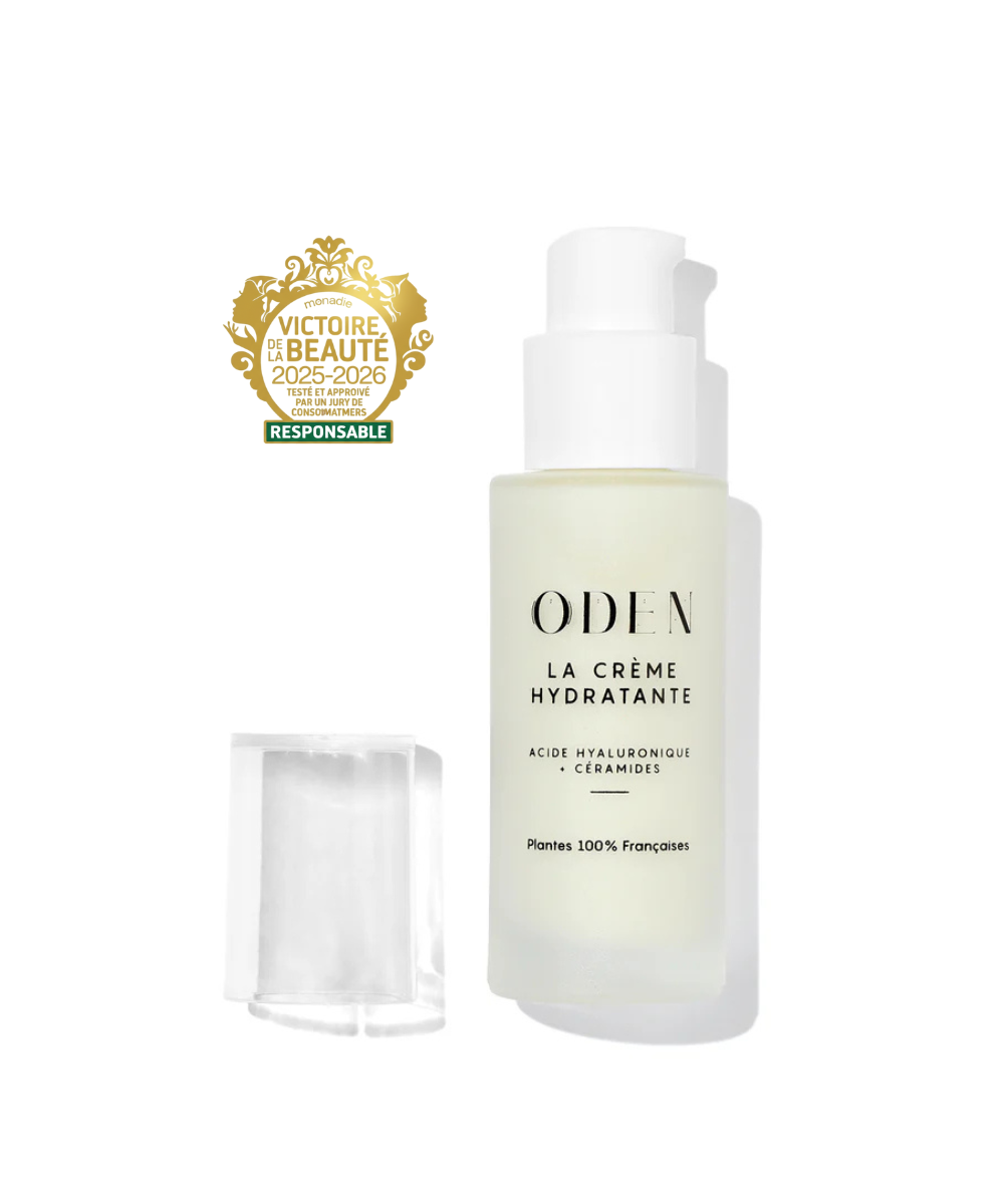 Hydrating cream bottle with ODFA branding on a white background