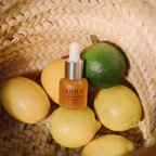 Oden_viatminoil bottle with lemons and limes in a woven basket